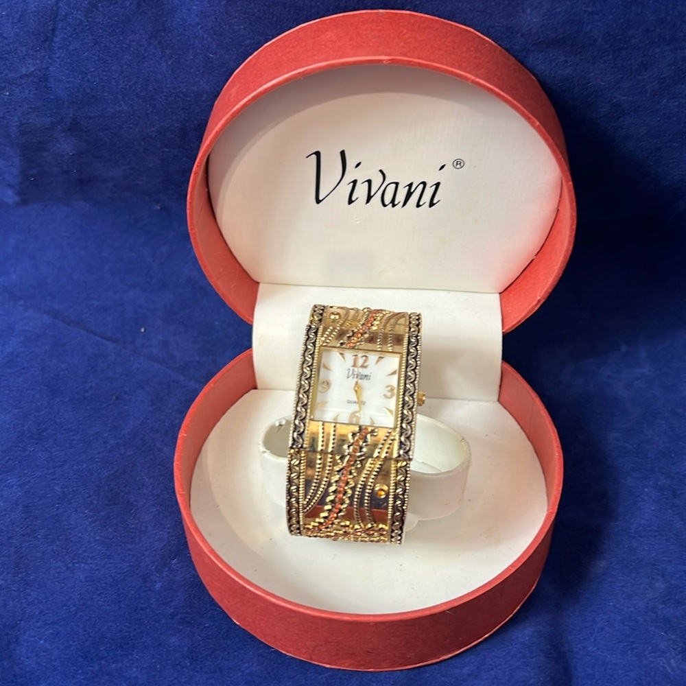Gold tone vintage Vivani cuff watch